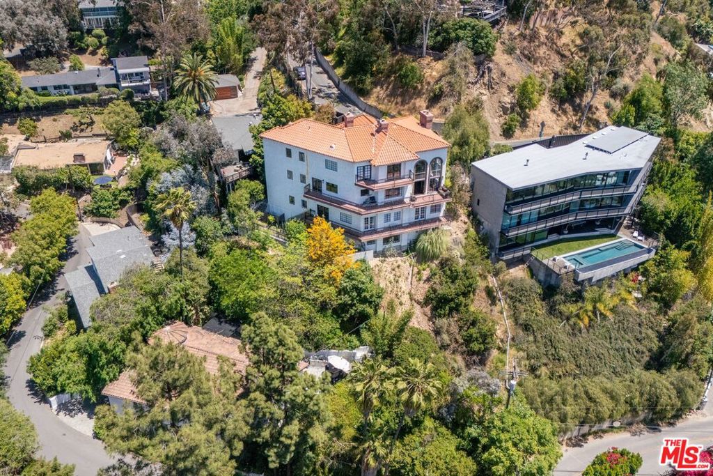 Residential for sale at 2651 La Cuesta Drive, Los Angeles CA featuring 5 beds and 5 baths