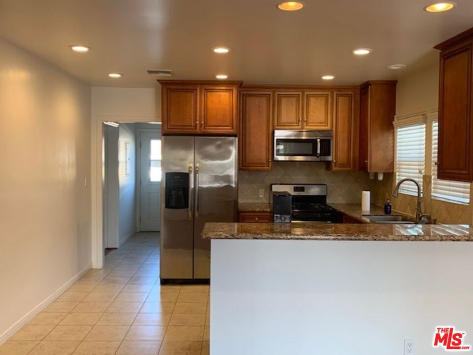 Residential Income for sale at 1305 W 37th Place, Los Angeles CA featuring 7 beds and 4 baths