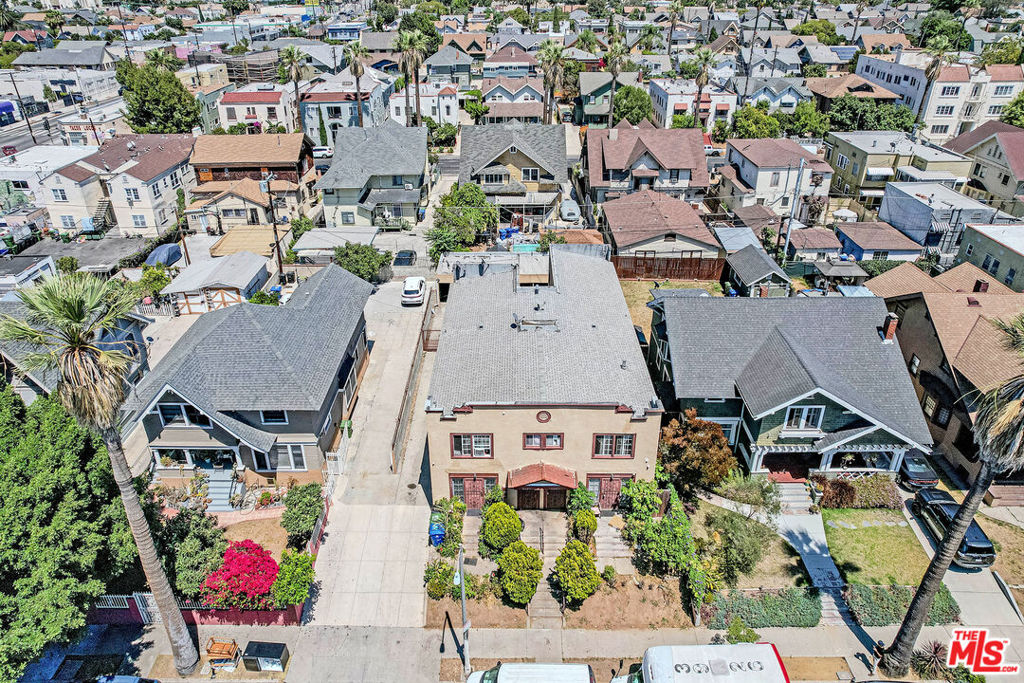 Residential Income for sale at 1662 S Hobart Boulevard, Los Angeles CA featuring 6 beds and 2 baths