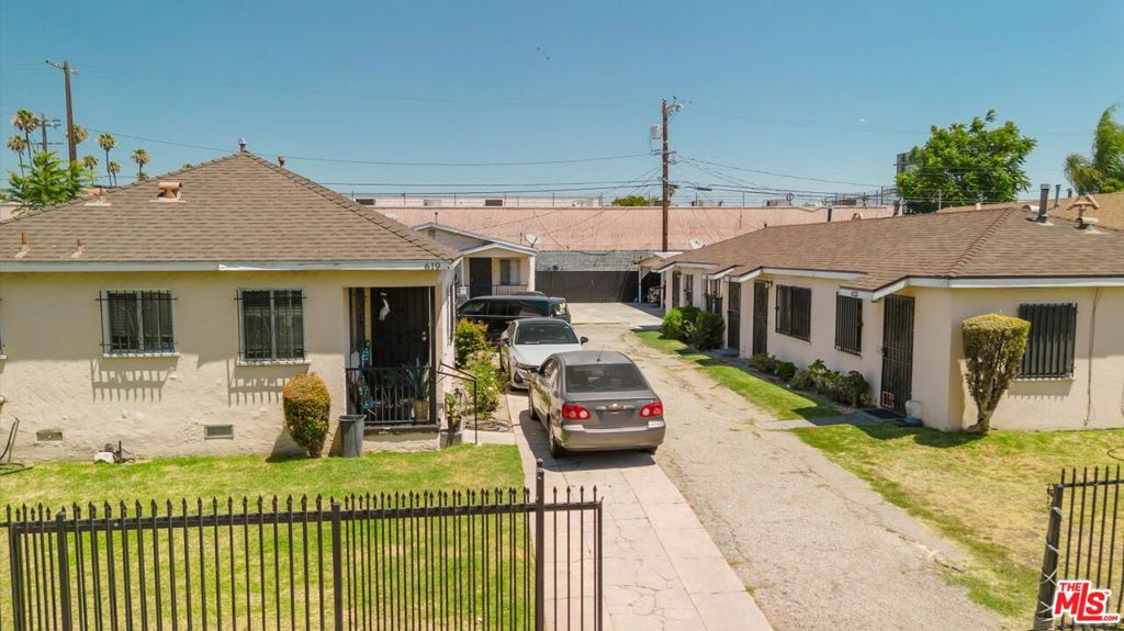 Residential Income for sale at 623 E 87th Street, Los Angeles CA and 4 baths