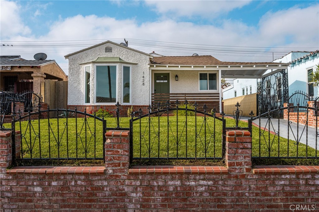 Residential for sale at 1428 W 89th Street, Los Angeles CA featuring 4 beds and 2 baths