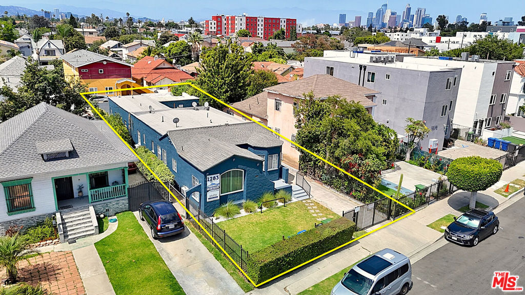 Residential Income for sale at 1283 W 36th Street, Los Angeles CA featuring 6 beds and 4 baths