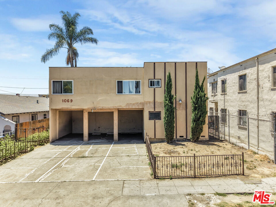 Residential Income for sale at 1069 N Oxford Avenue, Los Angeles CA featuring 13 beds and 13 baths