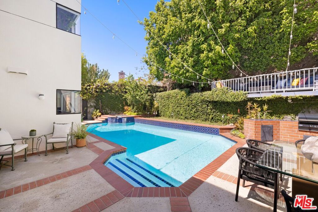Single Family Residence for sale at 2549 Canyon Oak Drive, Los Angeles, CA featuring 4 beds and 4 baths