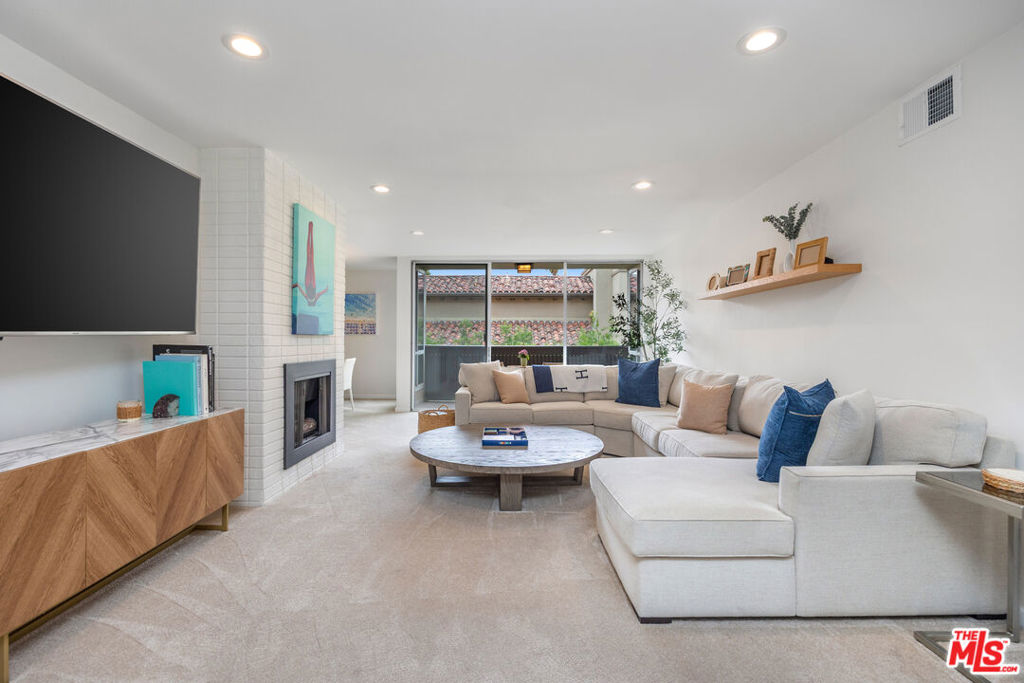 Condominium for sale at 809 S Bundy Drive 205, Los Angeles, CA featuring 2 beds and 2 baths