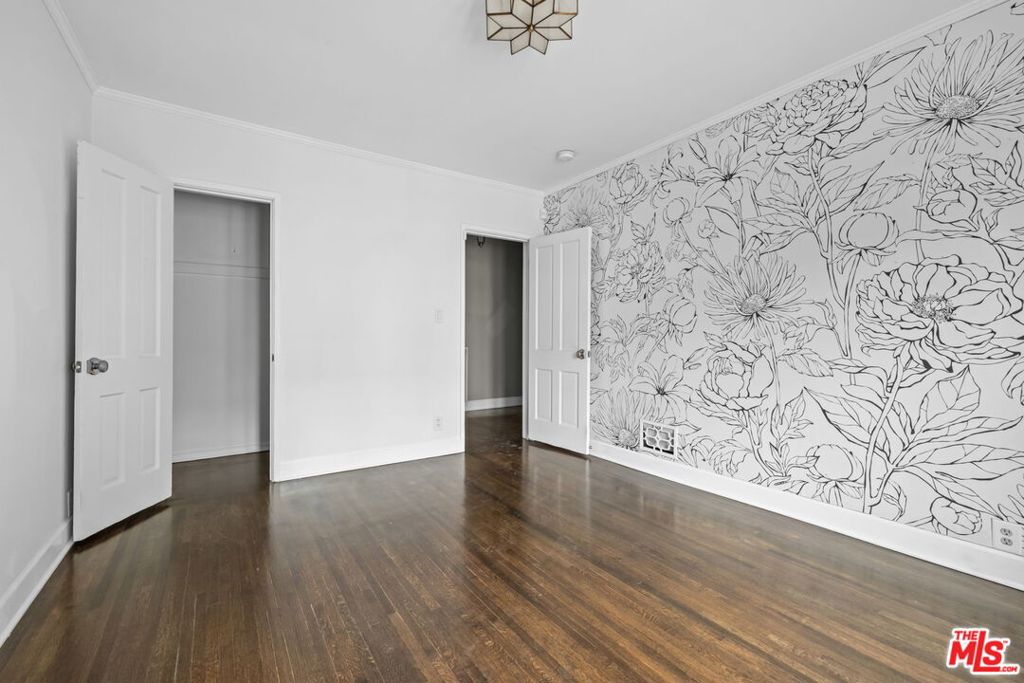Residential Income for sale at 1307 S Rimpau Boulevard, Los Angeles, CA featuring 6 beds and 4 baths