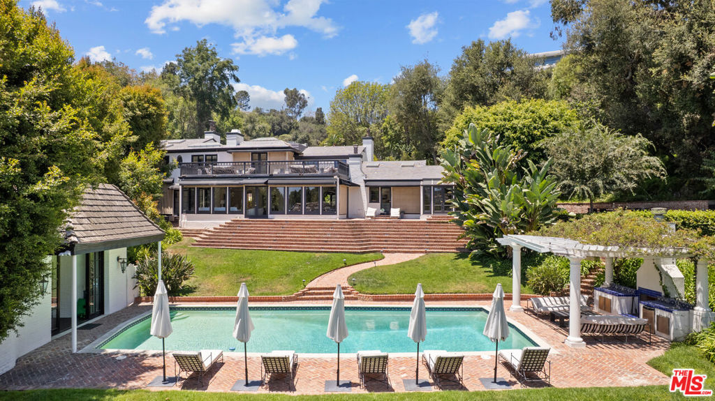 Single Family Residence for sale at 10981 Bellagio Road, Los Angeles, CA featuring 4 beds and 7 baths