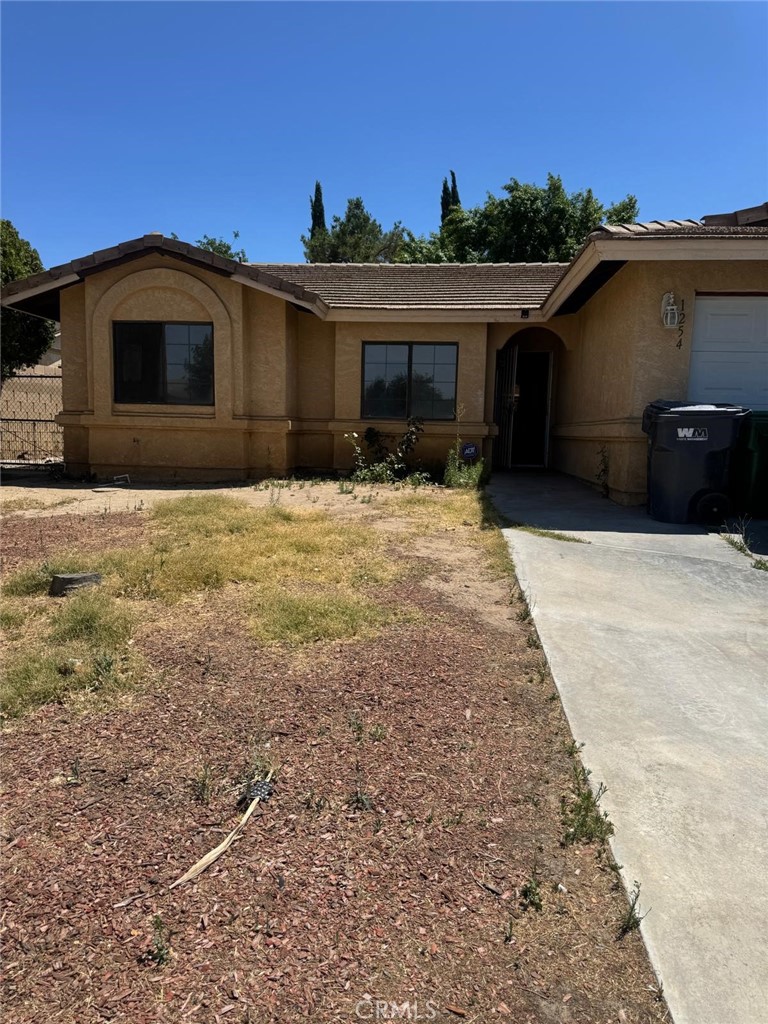 Residential Lease for rent at 1245 E Avenue J6, Lancaster, Los Angeles County CA featuring 3 beds and 2 baths