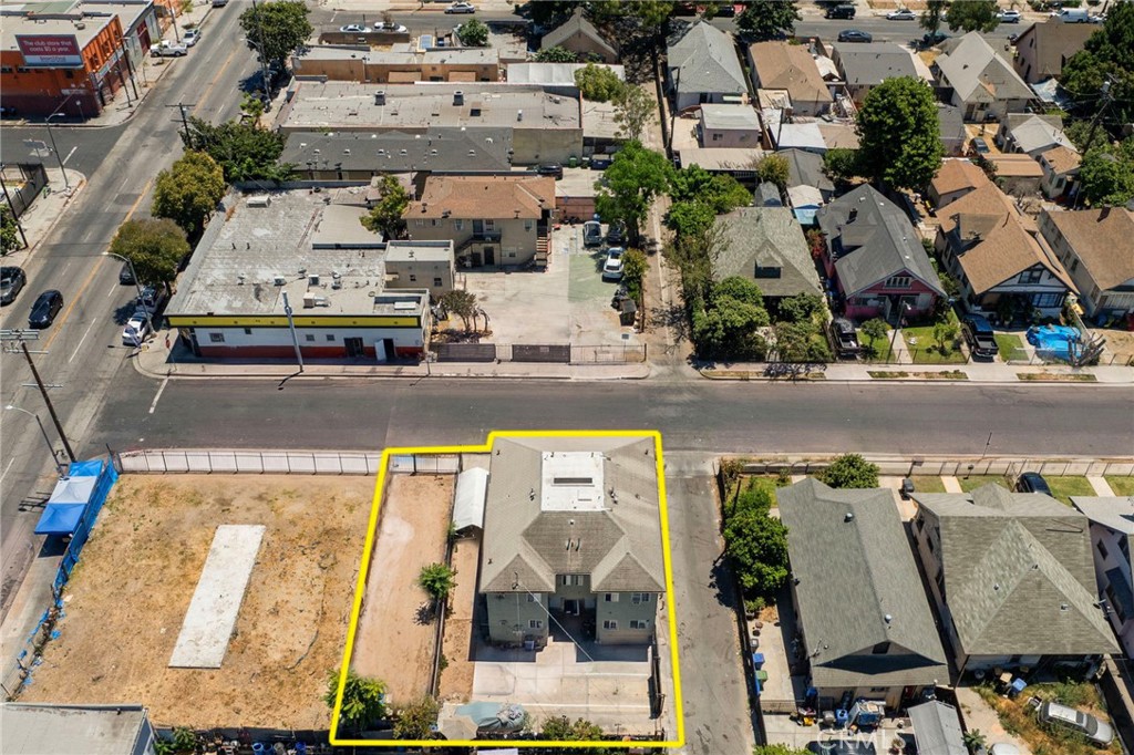 Quadruplex for sale at 1063 E 49th Place, Los Angeles, CA featuring 8 beds and 4 baths