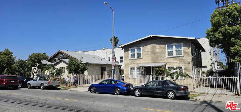 Single Family Residence for sale at 1120 N Van Ness Avenue, Los Angeles, CA featuring 7 beds and 4 baths