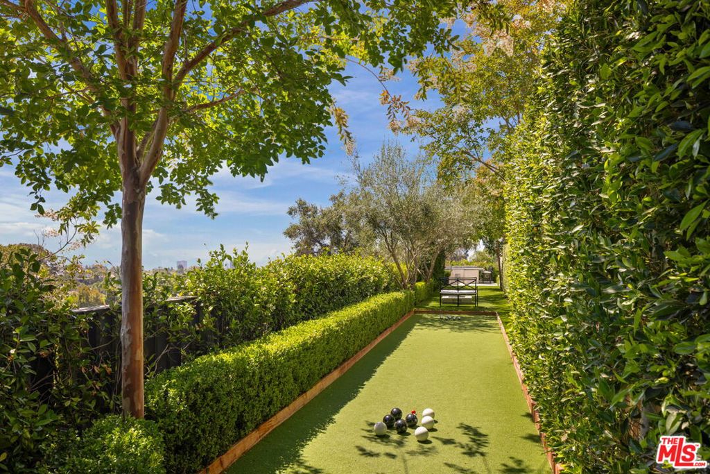 Single Family Residence for sale at 22 Oakmont Drive, Los Angeles, CA featuring 8 beds and 11 baths