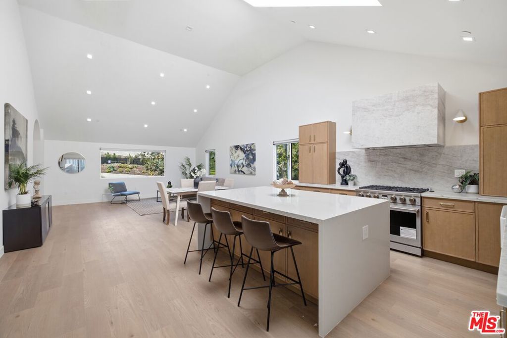 Single Family Residence for sale at 3926 S Ridgeley Drive, Los Angeles, CA featuring 3 beds and 4 baths