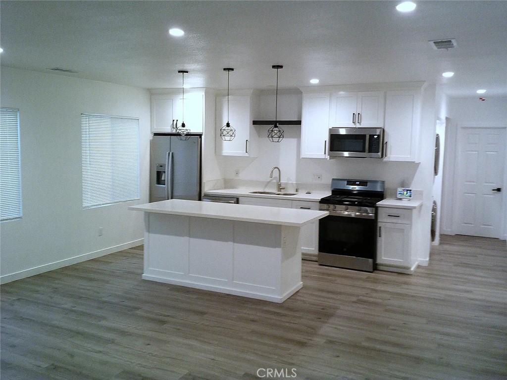 Duplex for rent at 120 E 68th St, Long Beach, CA featuring 4 beds and 3 baths
