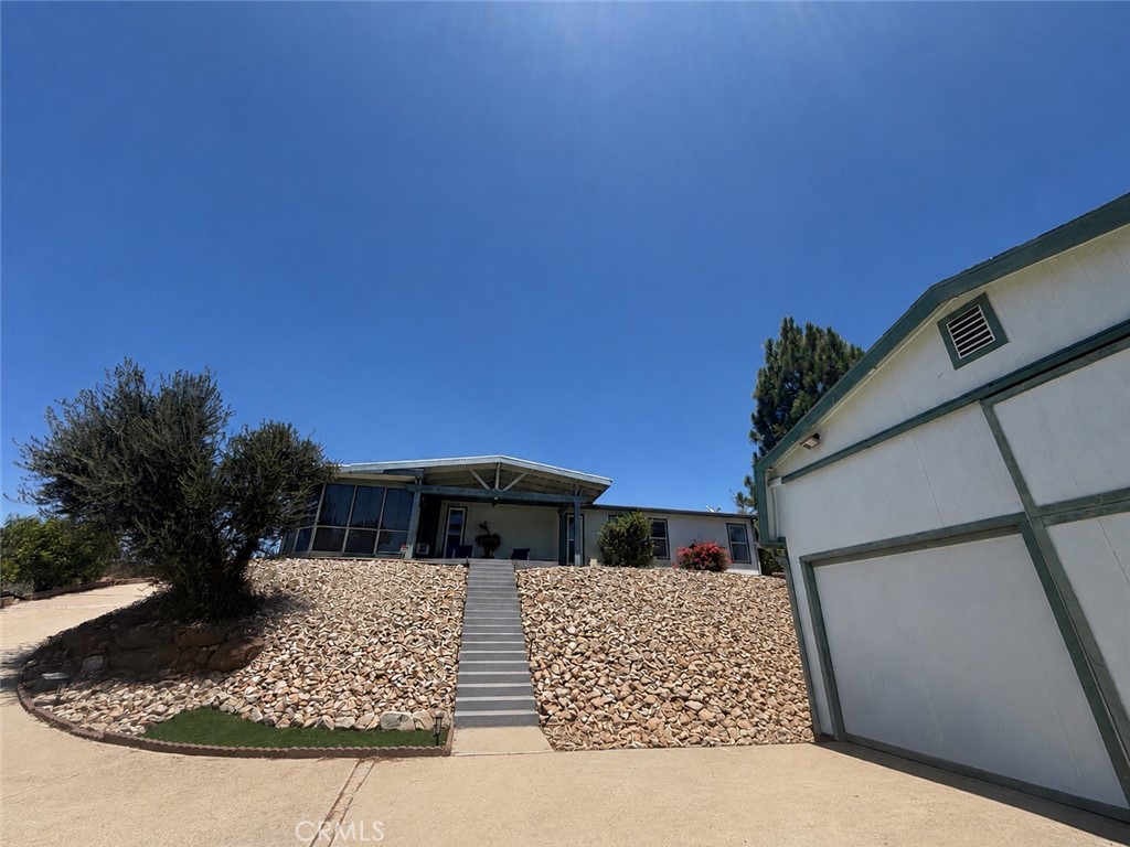Manufactured On Land for sale at 24440 Woodshed Way, Wildomar, CA featuring 2 beds and 3 baths