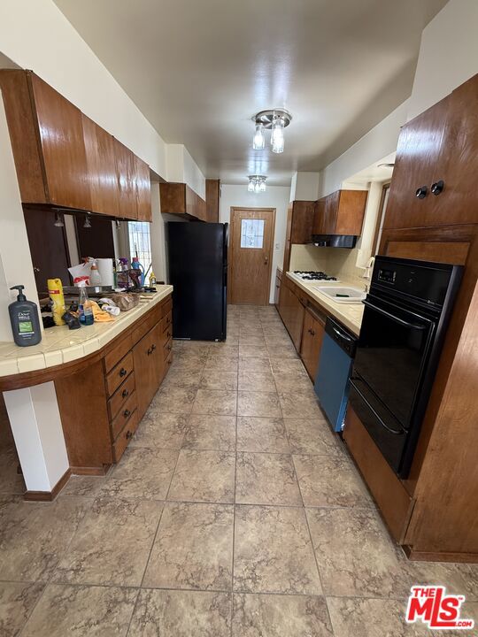 Single Family Residence for sale at 10318 S Manhattan Place, Los Angeles, CA featuring 2 beds and 2 baths