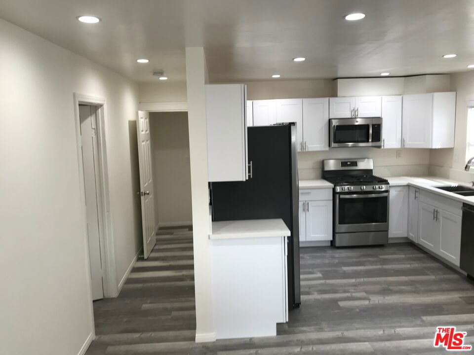 Residential Income for sale at 802 N Dillon Street, Los Angeles CA featuring 6 beds and 3 baths