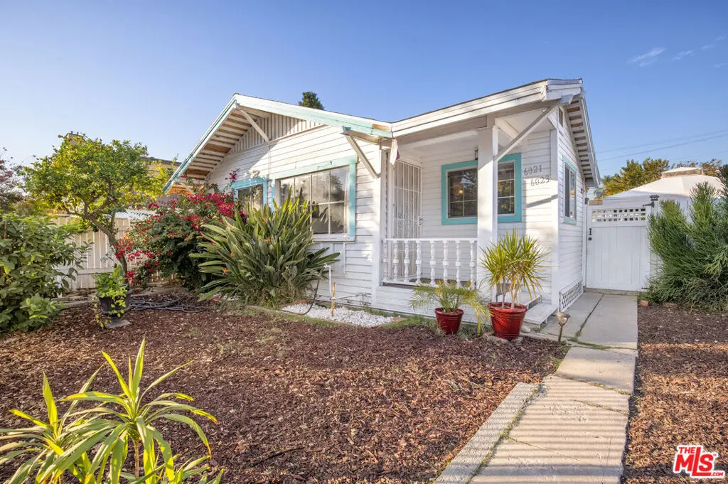 Single Family Residence for sale at 6021 Romaine Street, Los Angeles, CA featuring 4 beds and 2 baths