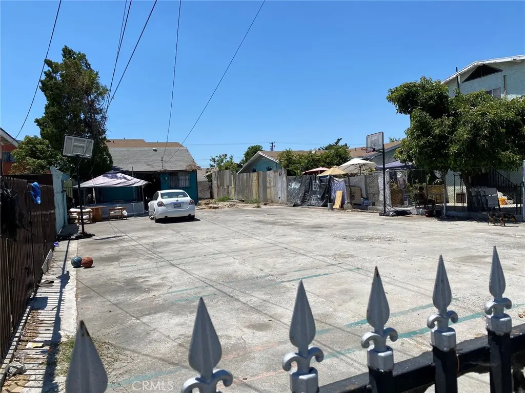 Duplex for sale at 7533 Maie Avenue, Los Angeles, CA featuring 9 beds and 8 baths