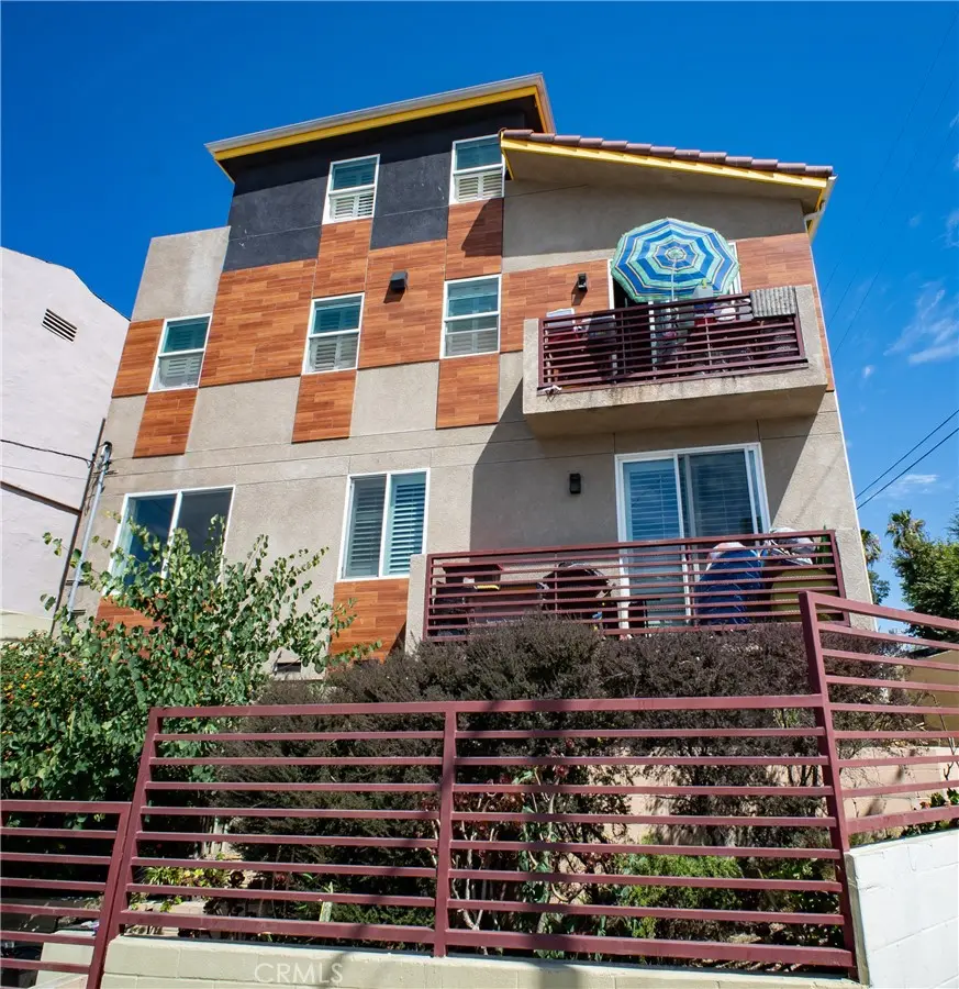 Triplex for sale at 2021 Miramar Street, Los Angeles, CA featuring 5 beds and 3 baths