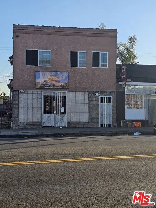 Residential Income for sale at 1714 W Florence Avenue, Los Angeles, CA featuring 4 beds and 4 baths