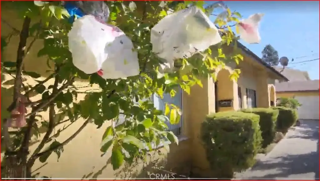 Triplex for sale at 1240 S Muirfield Road, Los Angeles, CA