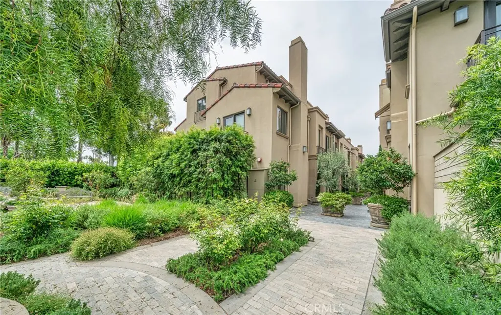 Townhouse for sale at 823 S Bundy Drive 110, Los Angeles, CA featuring 4 beds and 5 baths