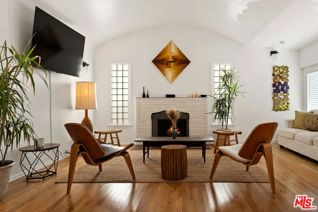 Single Family Residence for sale at 7459 Rosewood Avenue, Los Angeles, CA featuring 2 beds and 3 baths