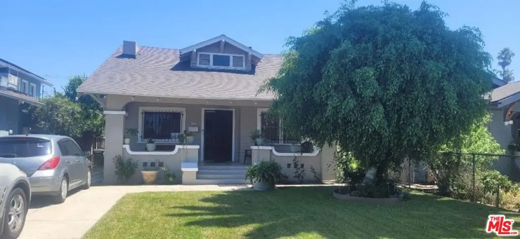 Single Family Residence for sale at 5102 Cimarron Street, Los Angeles, CA featuring 2 beds and 1 bath