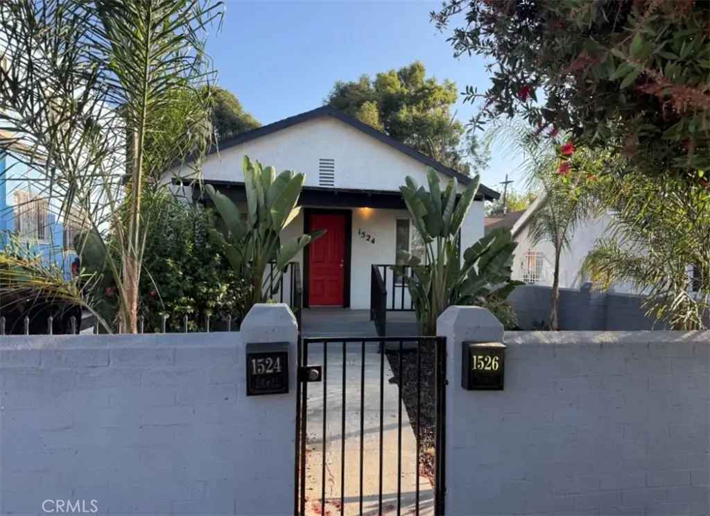 Duplex for sale at 1524 1526 E 105th Street, Los Angeles, CA featuring 4 beds and 2 baths