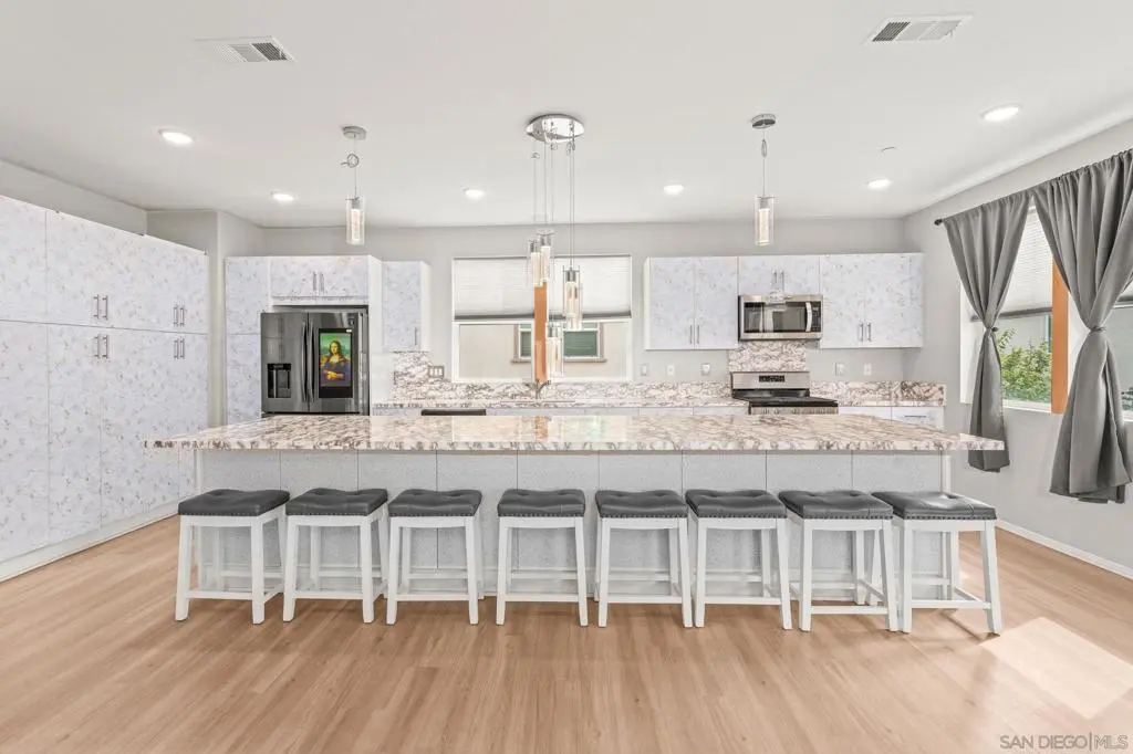 Townhouse for sale at 5361 Calle Rockfish 68, San Diego, CA featuring 3 beds and 4 baths