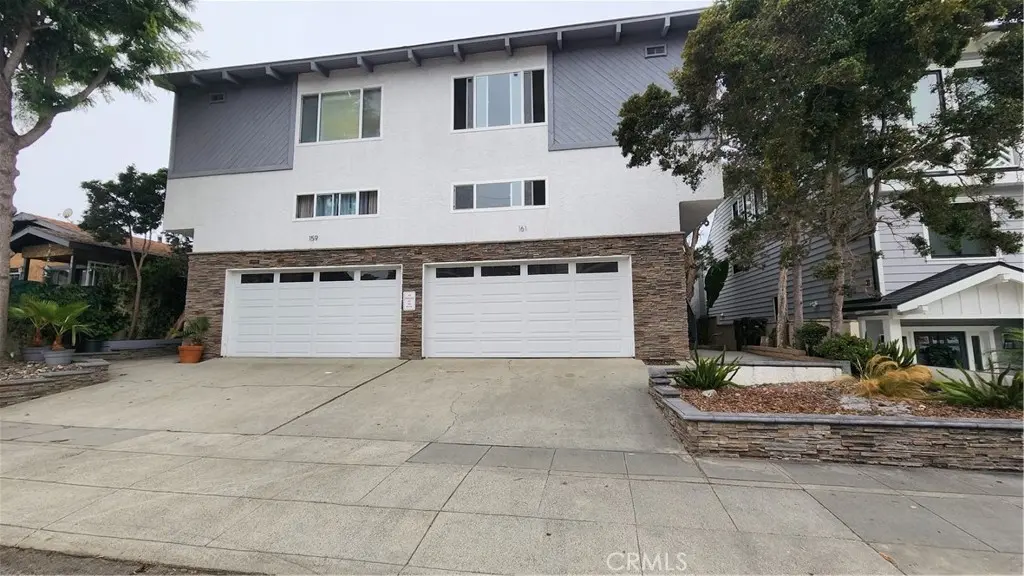 Townhouse for sale at 161 Monterey A, Hermosa Beach, CA featuring 3 beds and 3 baths