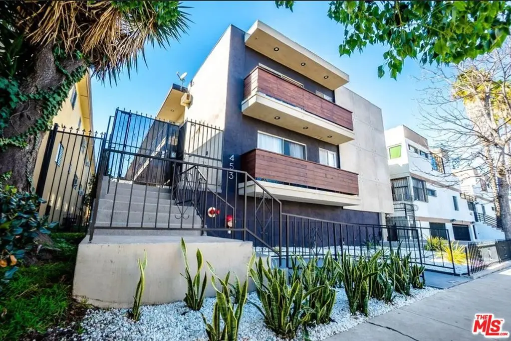 Residential Income for sale at 453 S Gramercy Place, Los Angeles, CA featuring 8 beds and 14 baths