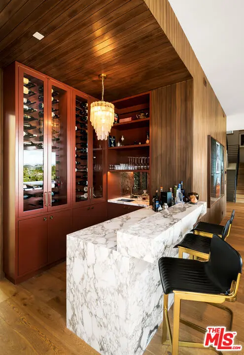 Single Family Residence for sale at 1030 Somera Road, Los Angeles, CA featuring 6 beds and 7 baths