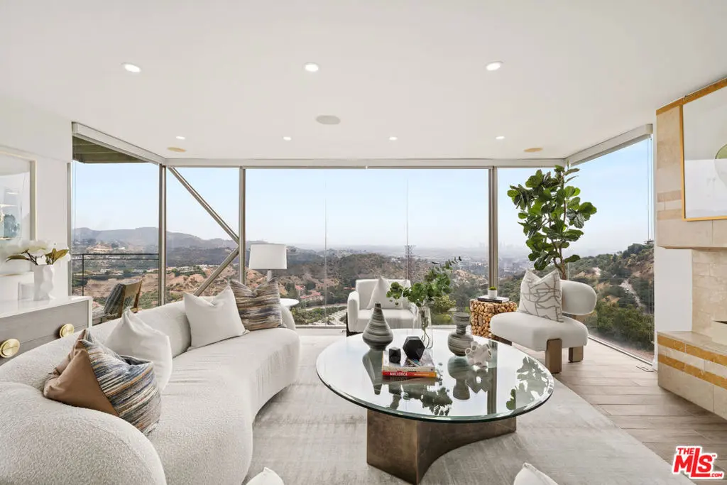 Single Family Residence for sale at 6960 Pacific View Drive, Los Angeles, CA featuring 4 beds and 3 baths
