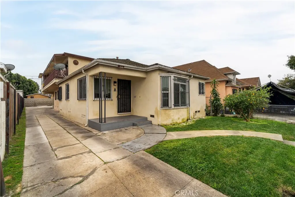 Quadruplex for sale at 154 E 82nd Place, Los Angeles, CA featuring 8 beds and 4 baths