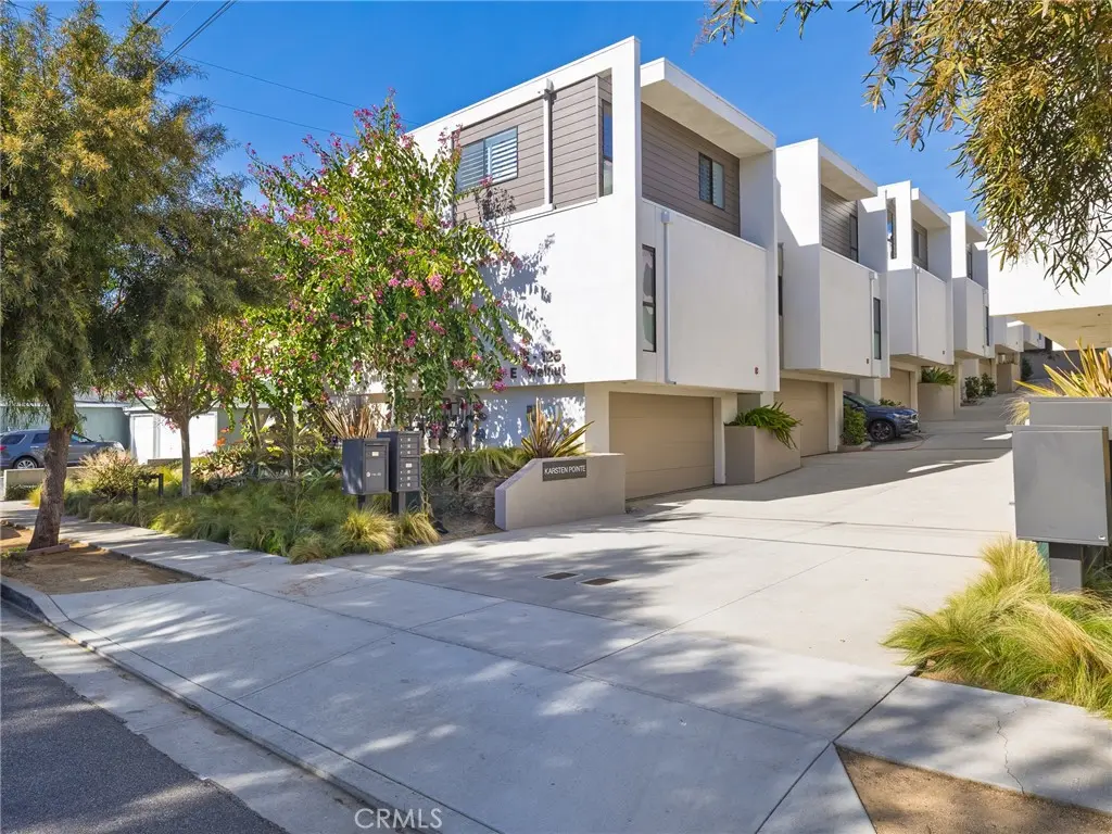 Townhouse for sale at 121 E Walnut Avenue, El Segundo, CA featuring 3 beds and 3 baths