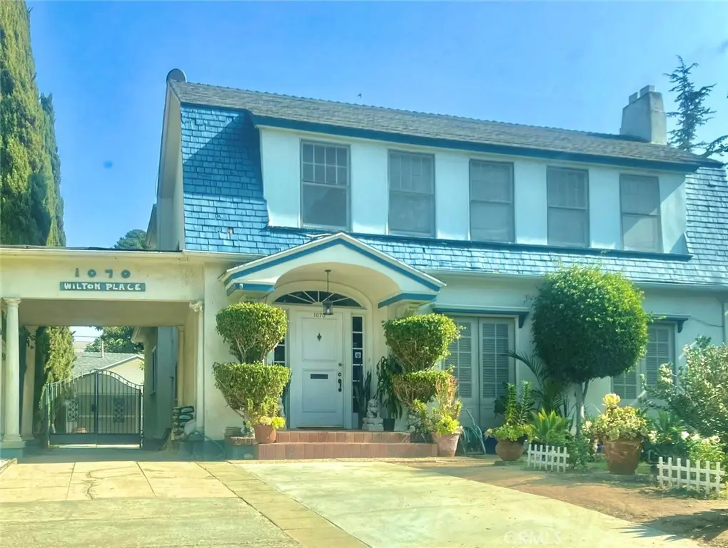 Single Family Residence for sale at 1070 S Wilton Place, Los Angeles, CA featuring 4 beds and 3 baths