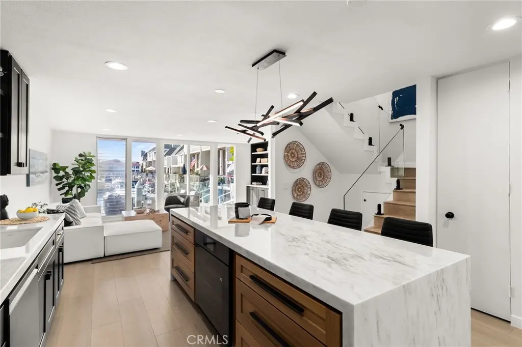 Townhouse for sale at 16435 Harbour Lane 13, Huntington Beach, CA featuring 2 beds and 3 baths