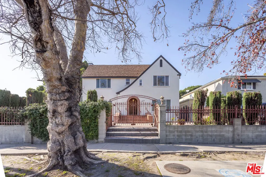 Single Family Residence for sale at 955 S Highland Avenue, Los Angeles, CA featuring 6 beds and 4 baths