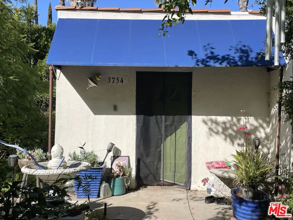Residential Income for sale at 3754 Fredonia Drive, Los Angeles, CA featuring 4 beds and 2 baths