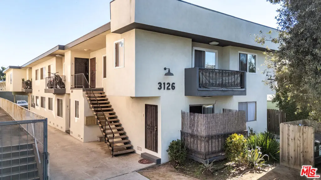 Residential Income for sale at 3126 S Canfield Avenue, Los Angeles, CA featuring 14 beds and 13 baths