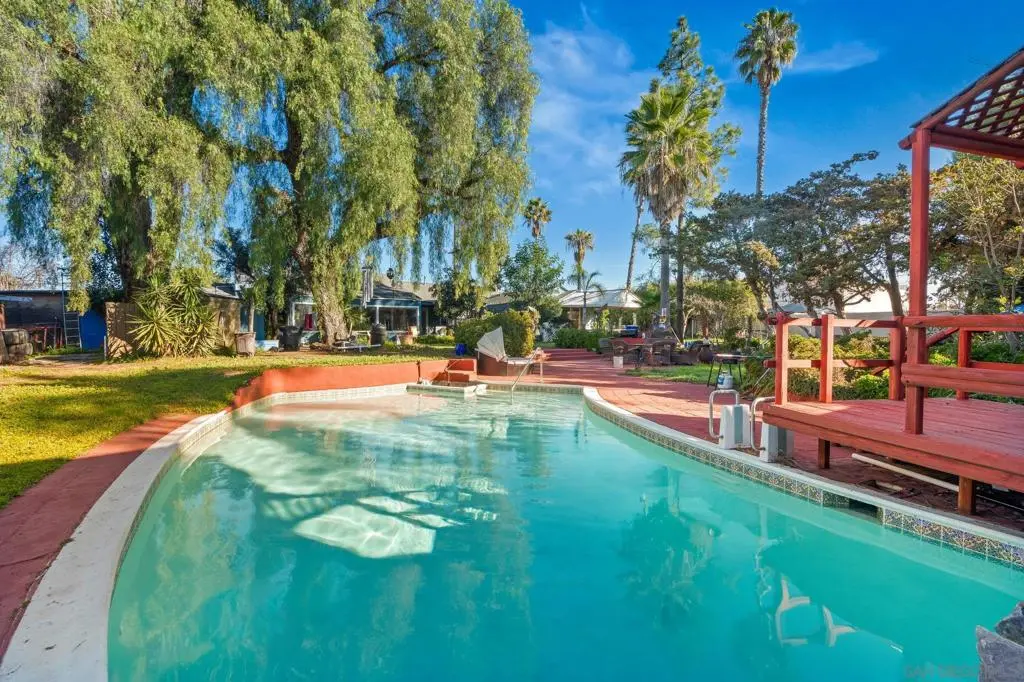 Single Family Residence for sale at 307 E Washington Ave, El Cajon, CA featuring 4 beds and 3 baths