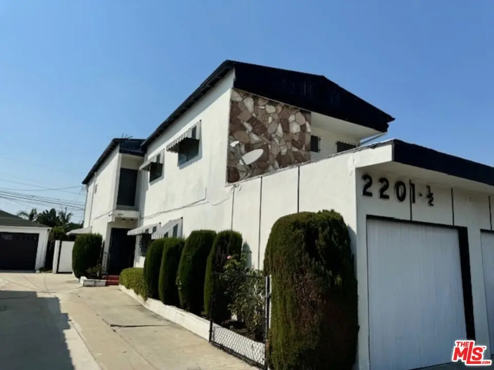 Residential Income for sale at 2201 S Ridgeley Drive, Los Angeles, CA featuring 4 beds and 4 baths