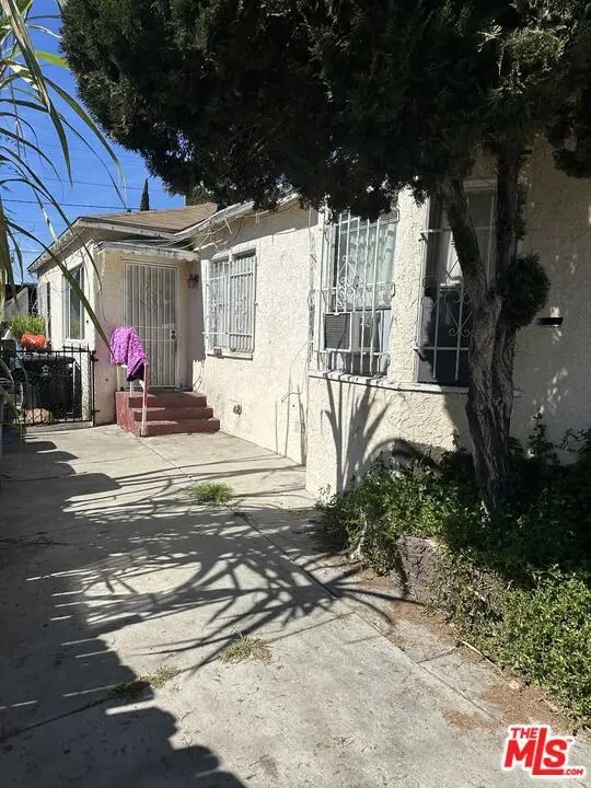 Residential Income for sale at 8611 Elm Street, Los Angeles, CA featuring 4 beds and 3 baths