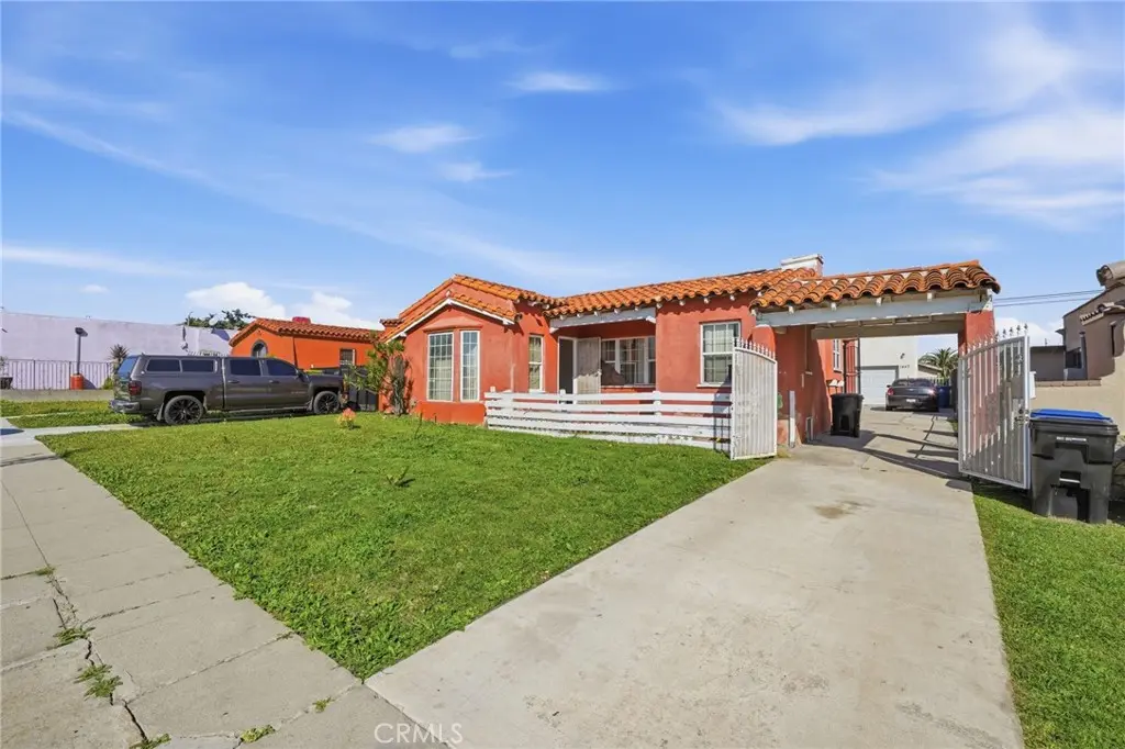 Duplex for sale at 1449 1447 W 83rd, Los Angeles, CA featuring 4 beds and 4 baths