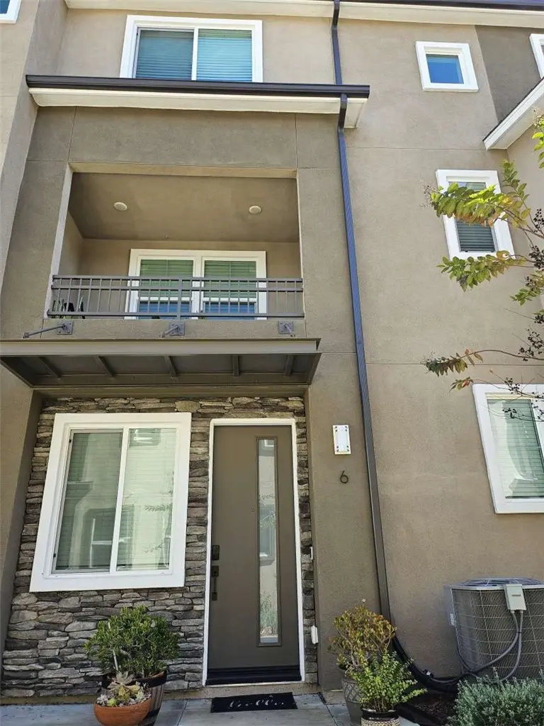 Townhouse for sale at 11737 Florence Avenue 6, Santa Fe Springs, CA featuring 3 beds and 4 baths