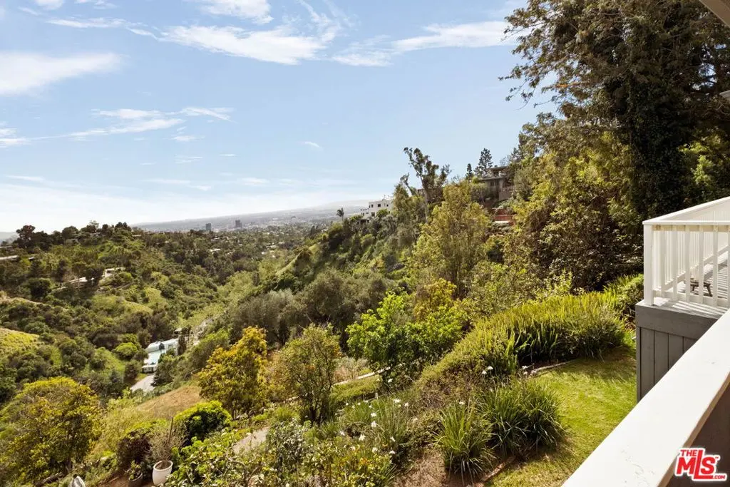 Single Family Residence for sale at 1406 N Kenter Avenue, Los Angeles, CA featuring 4 beds and 4 baths