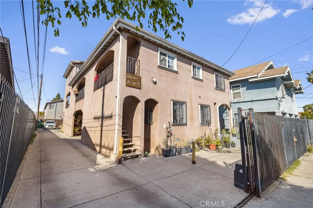 Quadruplex for sale at 879 E 40th Place, Los Angeles, CA featuring 11 beds and 5 baths