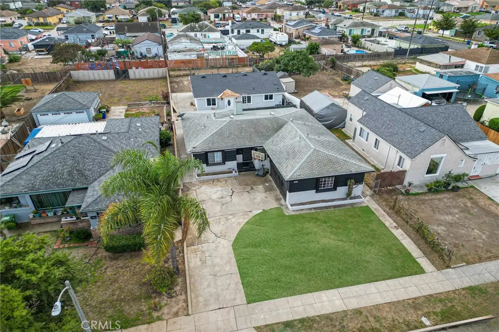 Single Family Residence for sale at 540 W 118th Street, Los Angeles, CA featuring 6 beds and 5 baths
