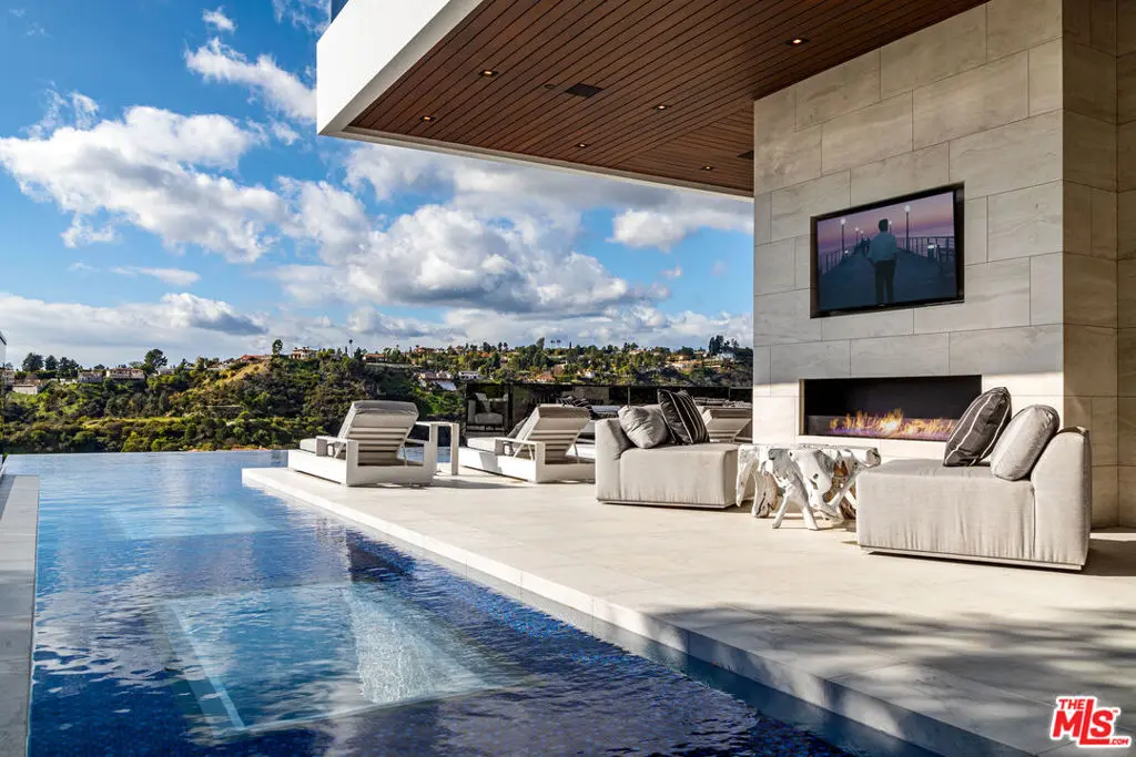 Single Family Residence for sale at 1475 Bel Air Road, Los Angeles, CA featuring 7 beds and 9 baths